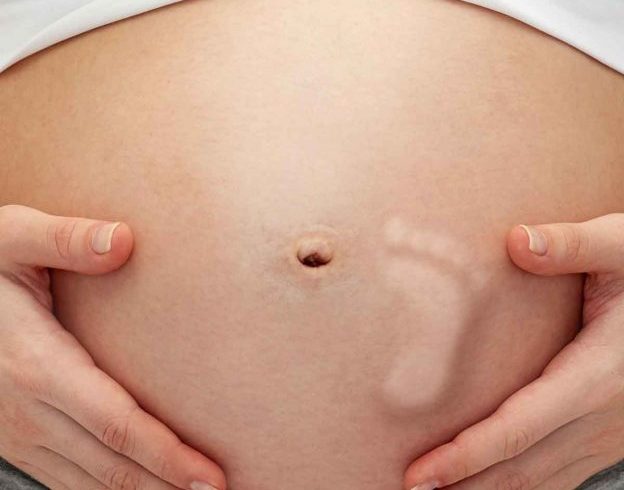 When does Pregnant woman should feel fetal kicks inside the womb?